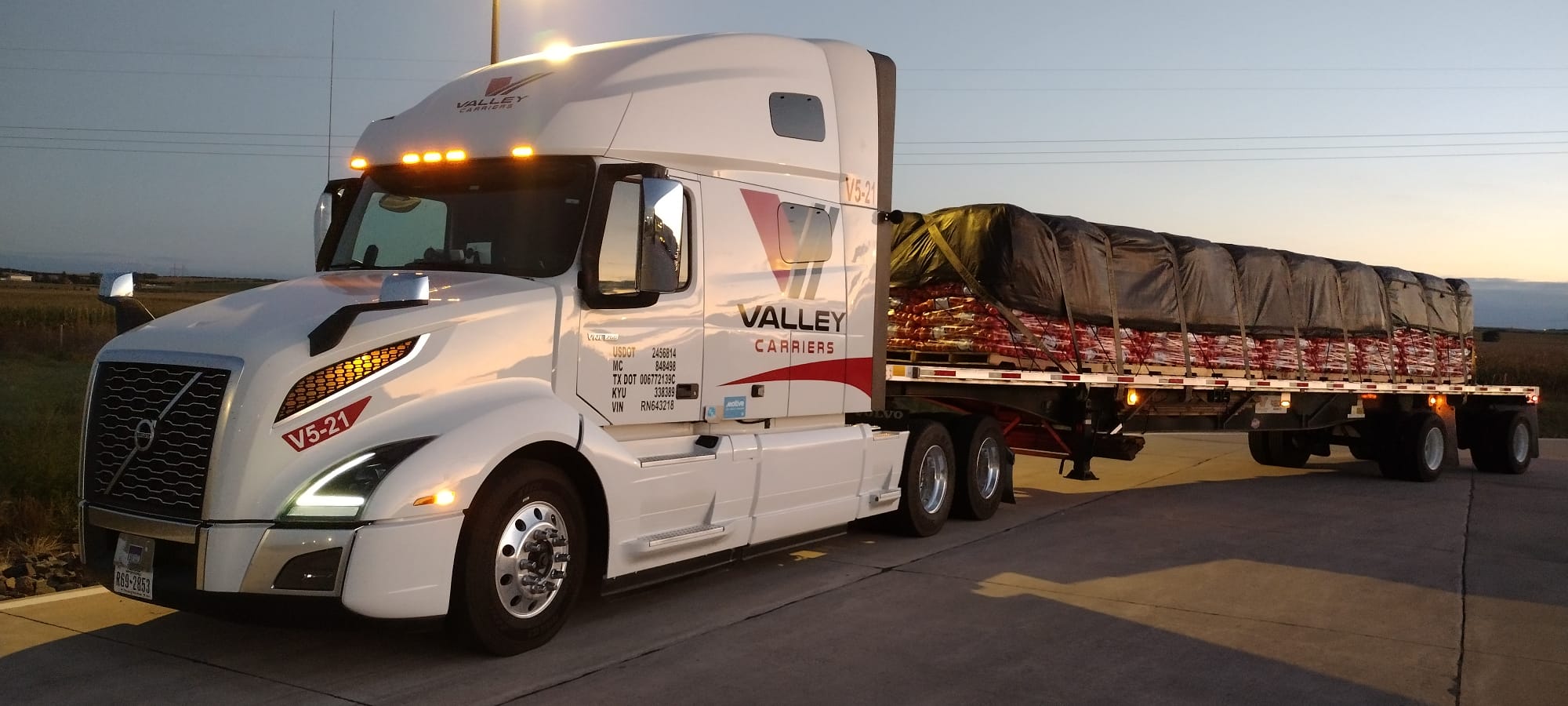 Valley Carriers tractor at dusk